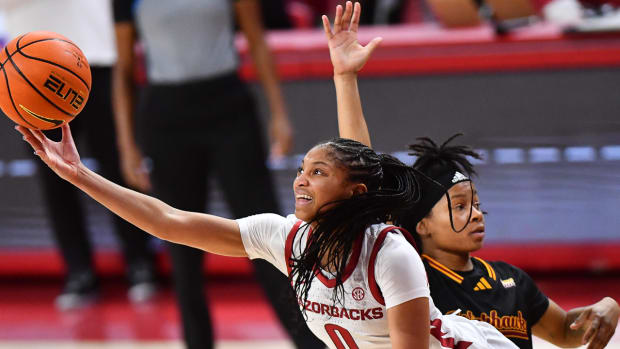 Razorbacks freshman Tahlia Scott putting up a shot in opener against ULM
